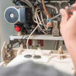 boiler replacement for low-income households in Manchester