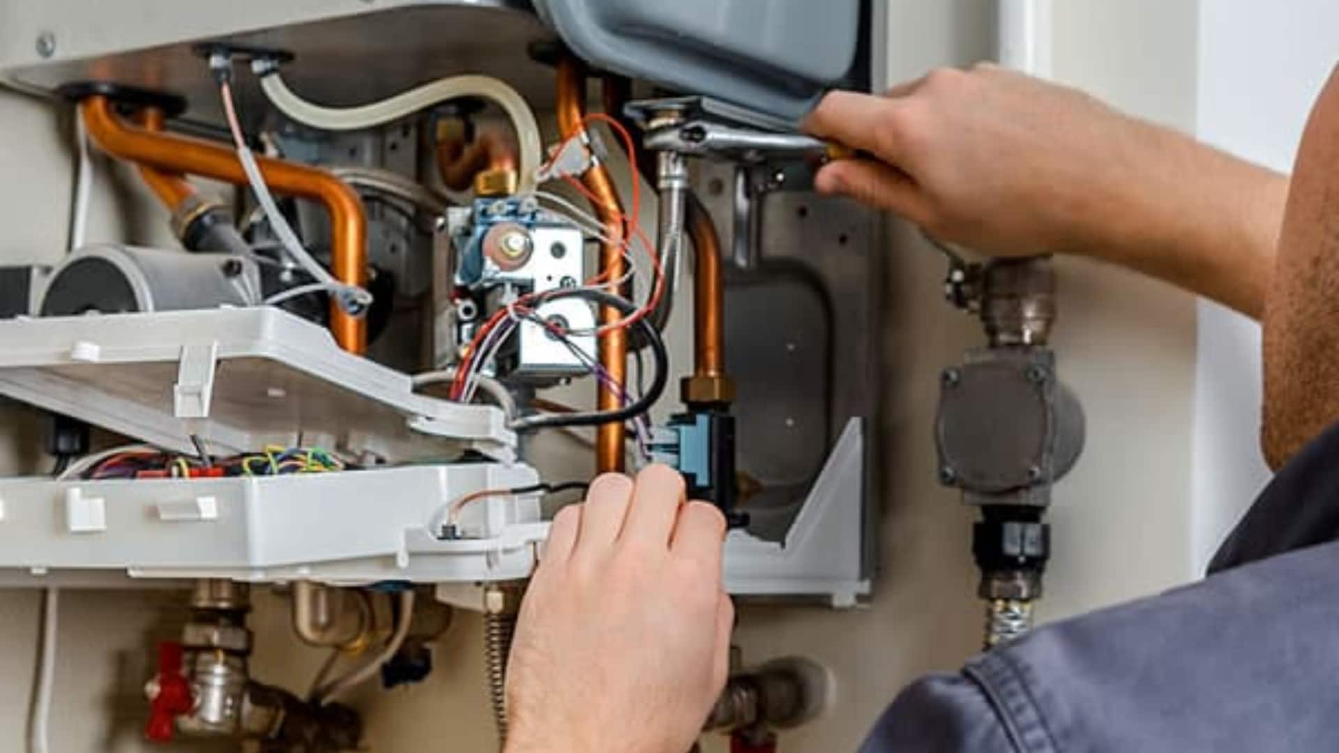 boiler replacement for low-income households in Manchester